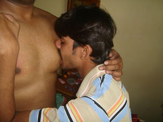 Kinky gay sex pics of horny guy sucking moobs