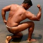 Indian Gay Porn: Sexy desi hunk bathing and flexing naked in a pond