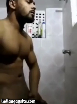 Horny nude hunk playing with big cock