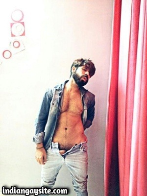 Muscular Indian hunk stripping naked for fun