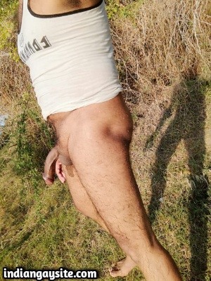 Naked gay exhibitionist having fun outdoors