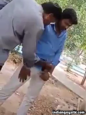 Public gay handjob of horny strangers in a park