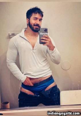 Handsome naked hunk stripping for fun in nudes