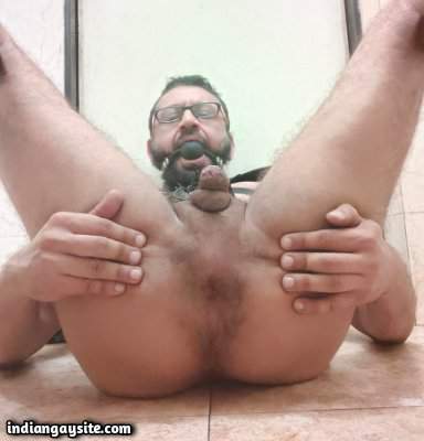 Gay bondage pics of slutty daddy going wild