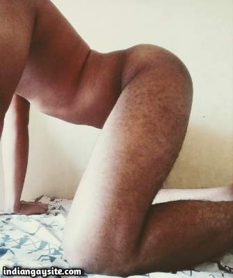 Young naked boy shows off sexy ass and body