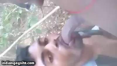 Outside gay blowjob with a big dick sucker slut