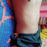 Young stripping boy teasing his hot nude body