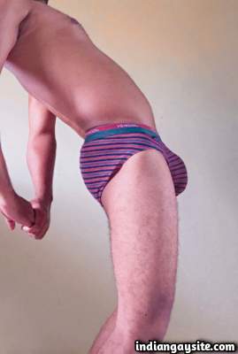 Young stripper boy posing in undies in nude pics