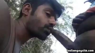 Public gay oral between horny guys out in the open