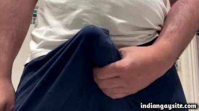 Wanking big bulge and cumming hard in wet shorts