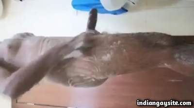 Bathing horny daddy teasing his thick hard boner
