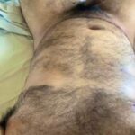 Hard horny man teasing his hairy and hot nude body in pics