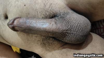 Hard nude guy teasing his big and juicy boner in pics