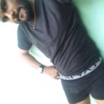 Horny underwear man teasing a big bulge in pics