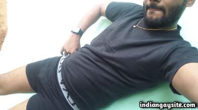 Horny underwear man teasing a big bulge in pics