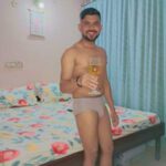Fit nude hunk teasing his sexy body in gay porn pics