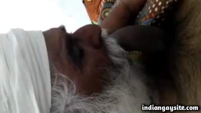 Gay Punjabi daddy sucks on a big juicy uncut cock