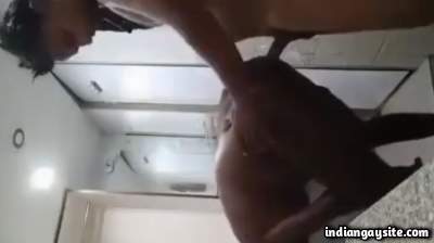 Bathroom sex fun with a horny daddy in doggy style