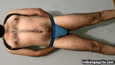 Fit stripping man teasing hairy body in gay pics