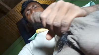 Naked hunk holding his big black cock