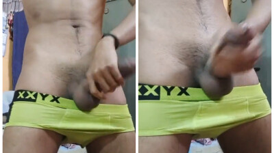 Sexy young gay boy playing with his huge dick at home