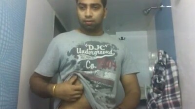 Horny stud stripping and masturbating in guest bathroom