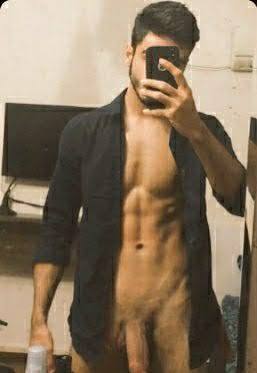 Ripped hunk undressing himself