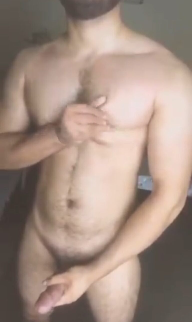 Muscular hunk stripping and jerking off