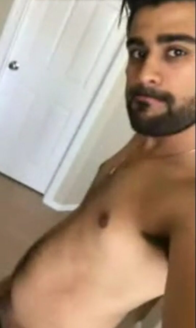 Hot hunk strips and plays with his cum filled cock